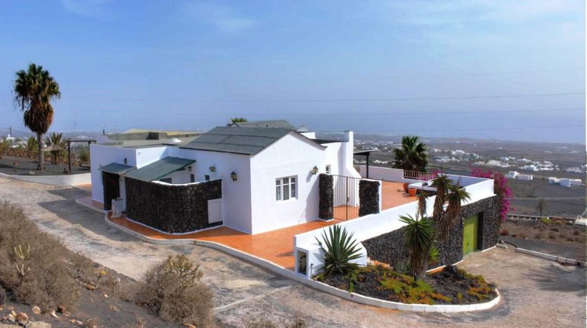 property in lanzarote with sea and mountain views